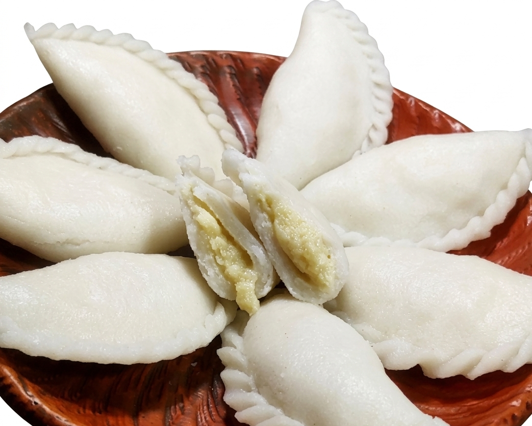 Puli Pitha – Soft Rice Flour Dumpling with Delicious Traditional Bengali Filling